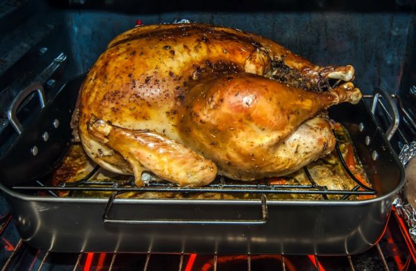 Turkey roasting in the oven. Mmmm. ....